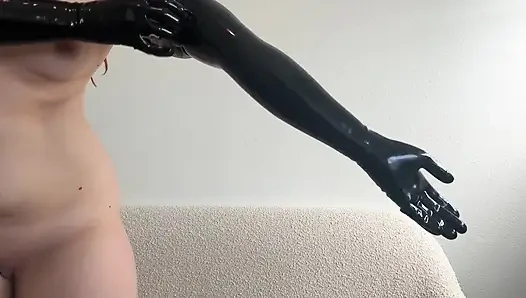 Hot Domme Redhead Teases in Latex Opera Gloves and Thigh High Boots