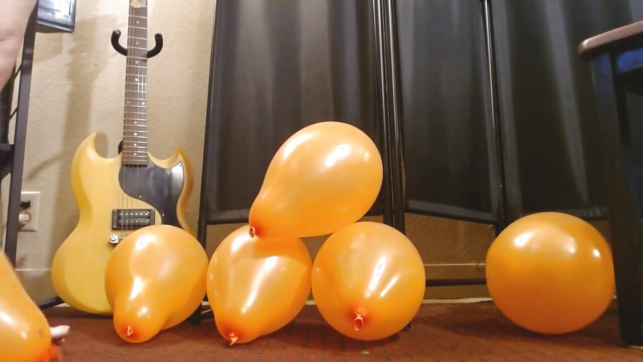 Toenail Popping Bunch of Orange Balloons