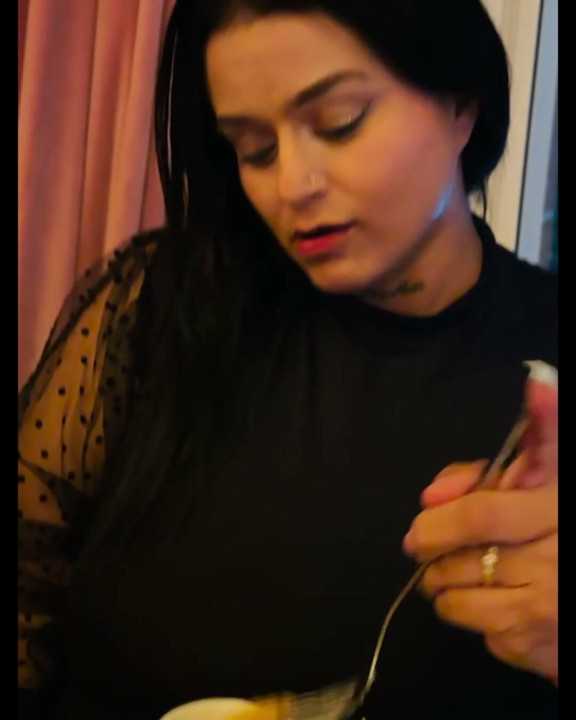 Latina and hot eating in an extremely delightful way