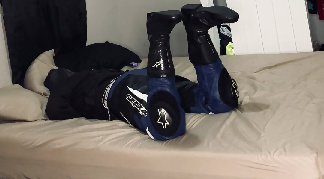 Biker in A Straitjacket and Tied