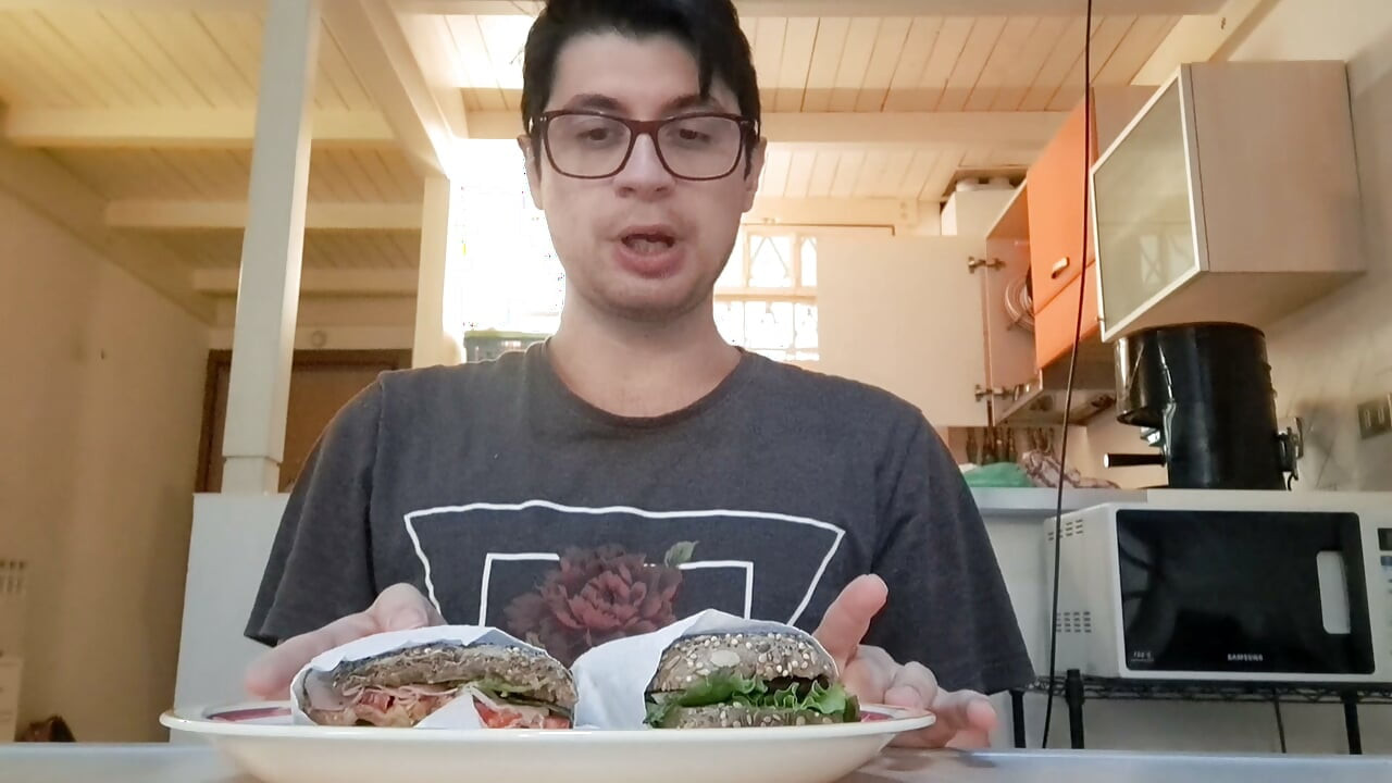 Pig guy eats a sandwich while jerking big cock