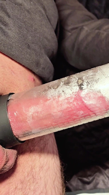 Key moment from "Huge multiple cum in a condom! I use a vacuum pump to help."