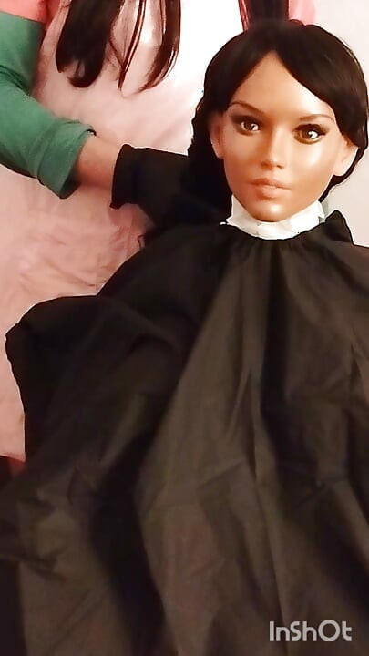 Ebony sex doll Nikki wears barberette capes