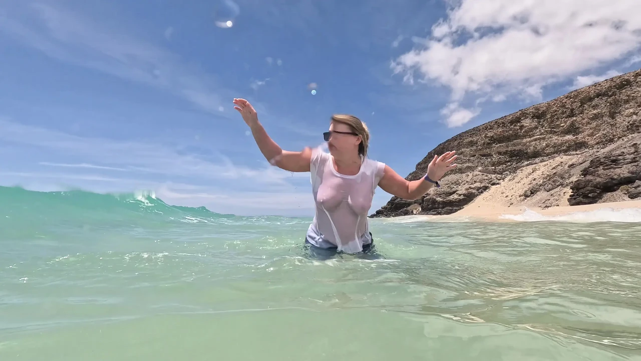 Girl Wetting Jeans in the Ocean and Swimming in Wet White T-shirt