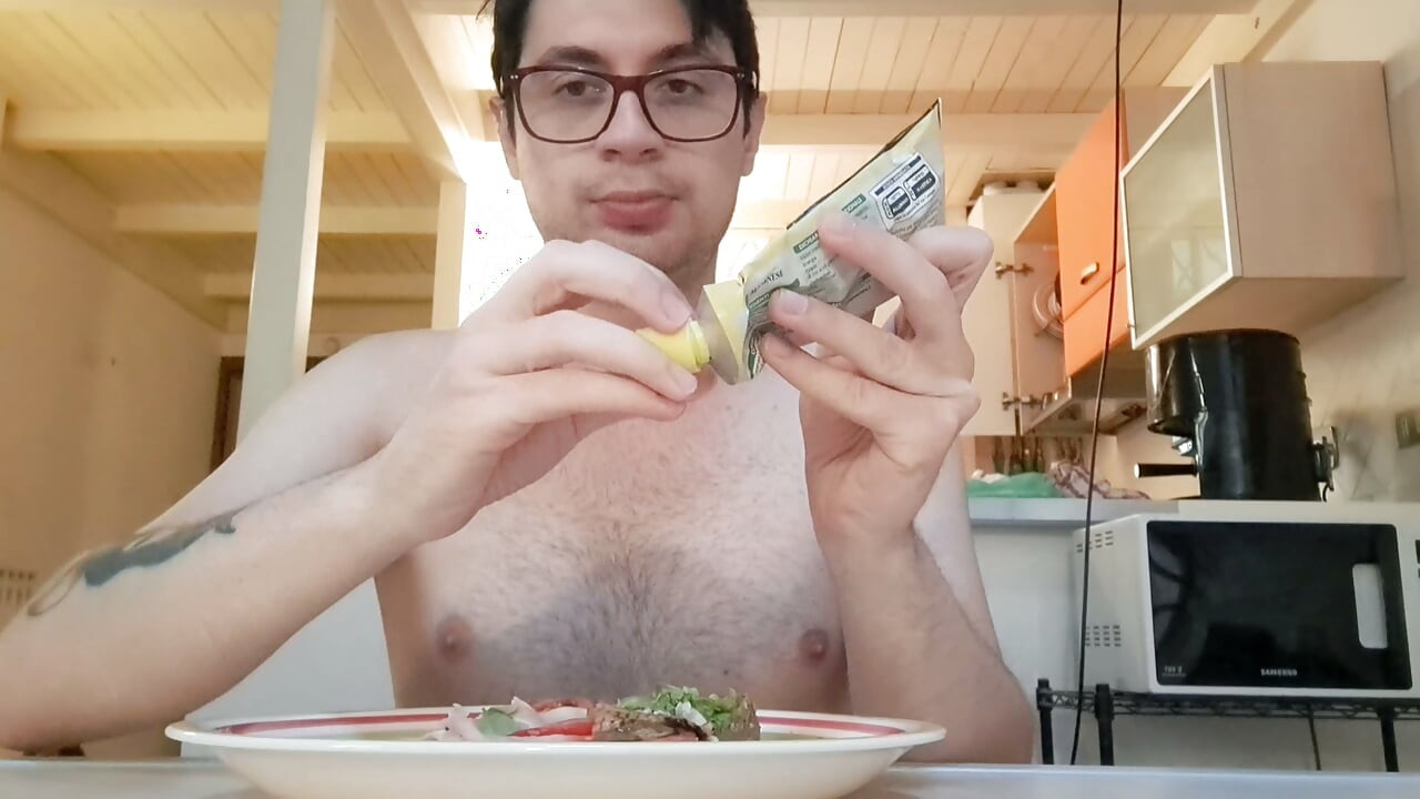 Pig guy eats a sandwich while jerking big cock