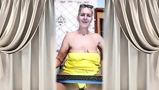 Cheerful Housewife Lukerya Shows Her Bare Feet in Kitchen. Mature Soles and Toes Close Up