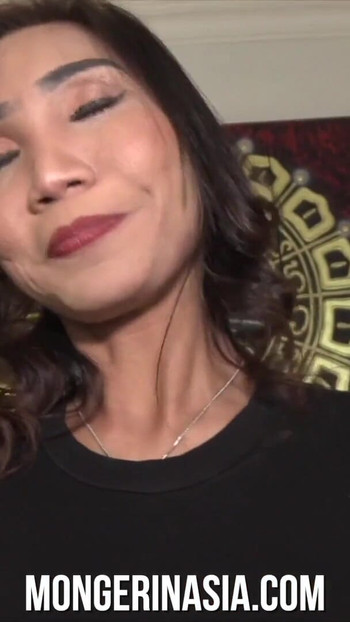 Captivating moment from "Stunning Asian MILF Wants Baby Number Two"