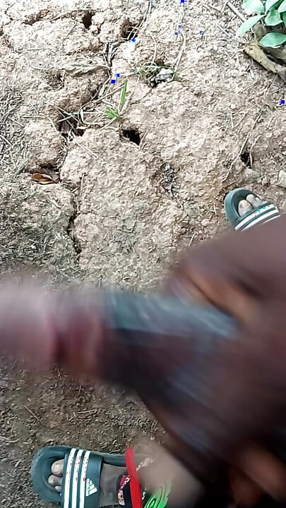 An African adult man masturbating inside the bush with his big dick