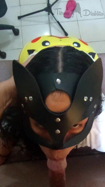 THE MASKED GIRL IS VERY DOCILE WHEN SHE HAS MY COCK IN HER MOUTH