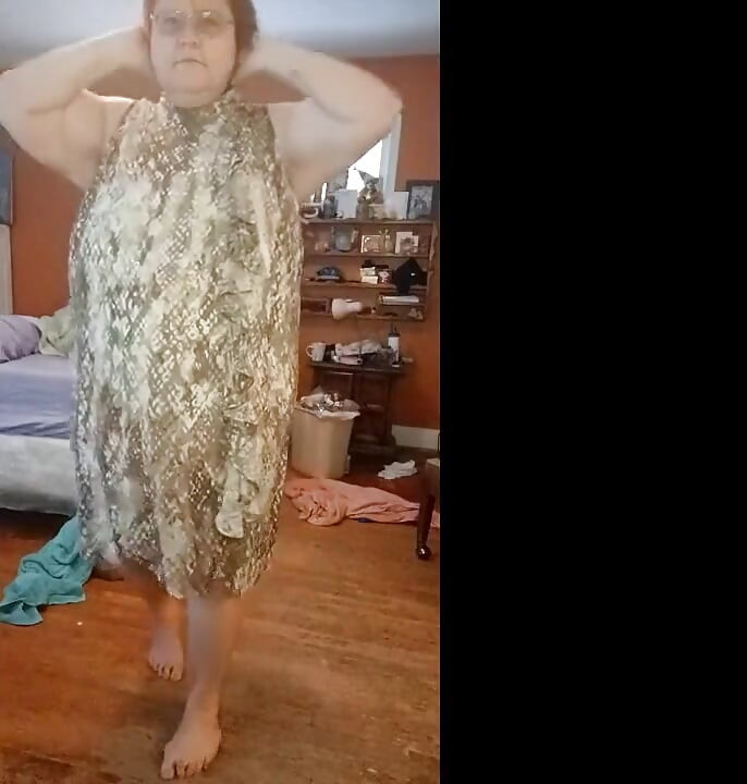 Dressing  in fluffy print dress from nude