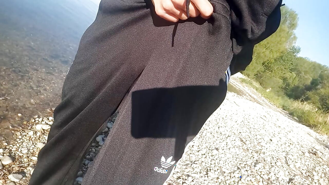 Who will spot this twink in a black and white adidas tracksuit, flashing his cock in public going commando freeballing, peeing i