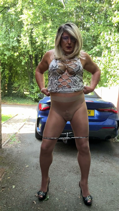 Sexy Crossdresser kellycd2022 in white animal print dress pantyhose and heels | Clip 2