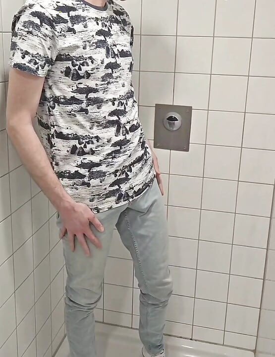Playing in shower fully clothed in jeans and chucks