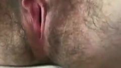 Hairy woman masturbating