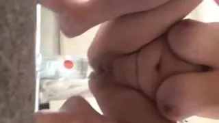 naughty milf fucking her self with a bottle