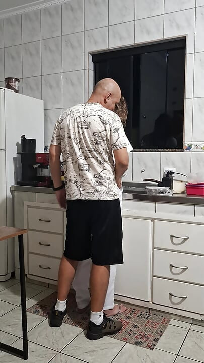 The maid got fucked in the ass in the kitchen while washing the dishes.