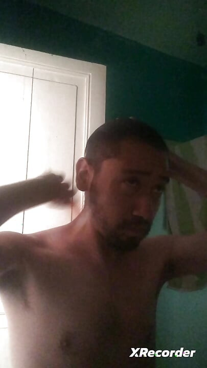 Man does his skincare in the morning