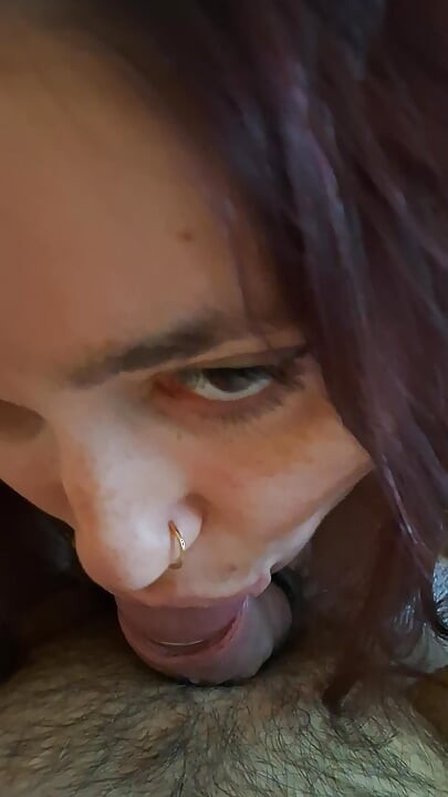 She  looks at me straight in the eyes while sucking my big cock balls deep in a POV close-up