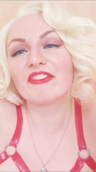 Emotional moment from "Strap-on POV video: topless Mistress in thigh high over knee boots with long gloves - Arya Grander"