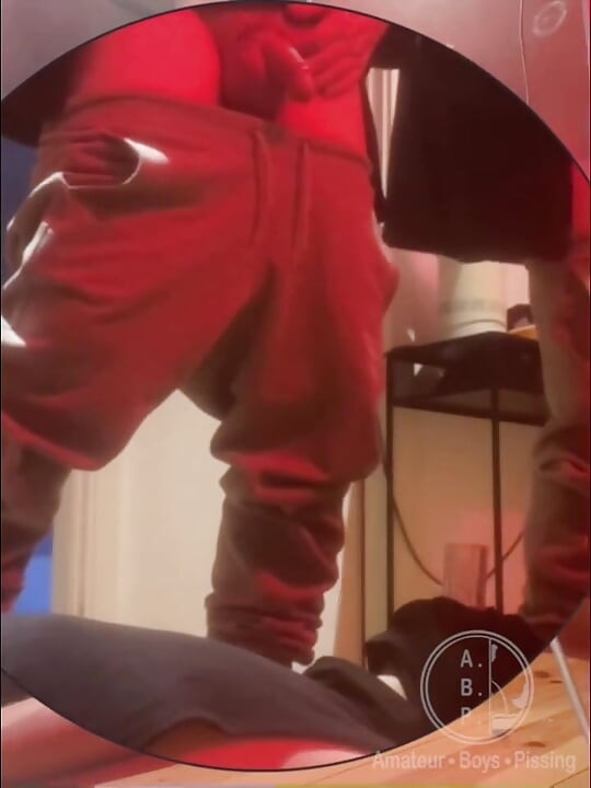 Amateur Boy Pissing in a Glass Held in His Friend's Mouth