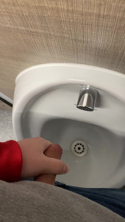 Cruising In the public urinal with big cumshot