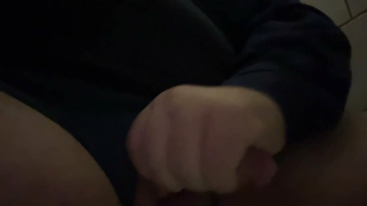 Jerking off in a public restroom stretching my little uncircumcised cock.