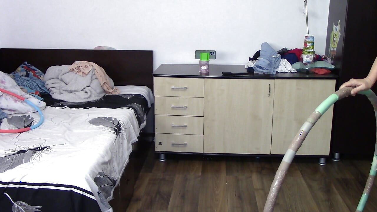 Sexy woman trains naked at home. Sexy brunette tries on pantyhose, hairy pussy, big ass, big tits.