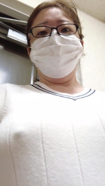 A Married Woman Masturbating in Front of the Door