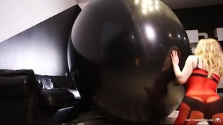 Sexy girl inside bondage balloon