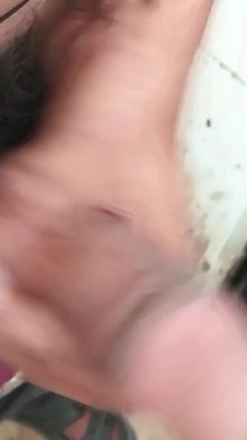 Key moment from "Handjob in public bathroom"