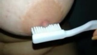 My nipple with toothbrush 1