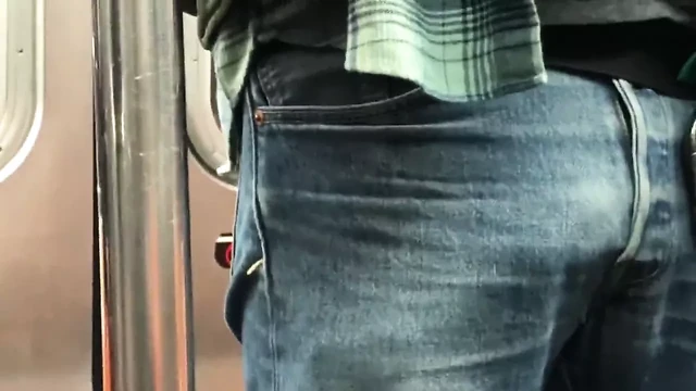very masculine worker on the subway