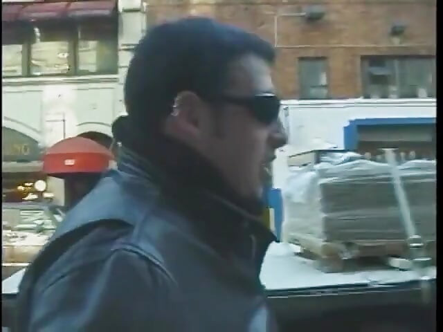 Hot dominatrix in leather with a great body puts a guy in clamps