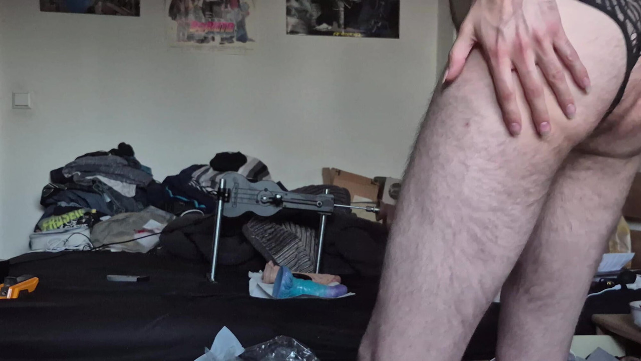 Preparing my Ass with my new plug, for my new Fuckmachine you see in the Background.