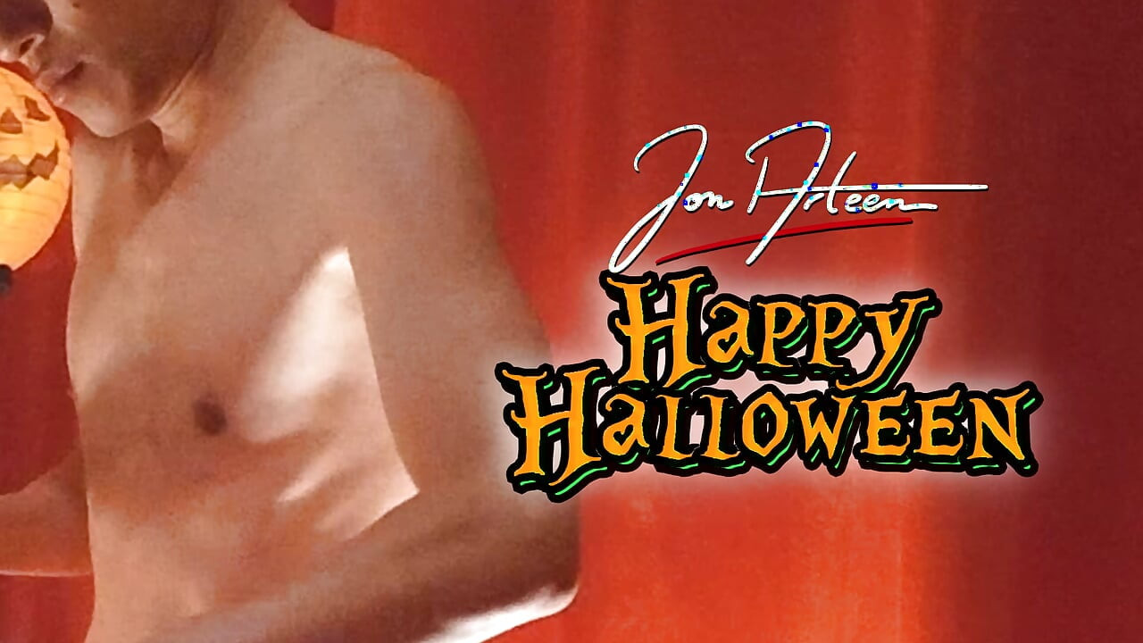 Cute twink Jon Arteen performs a sensual dance while carving a Halloween pumpkin