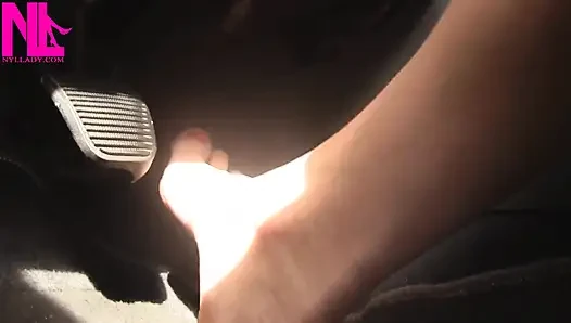 Nyllady with Her Bare Foot on Gas Pedal Driving