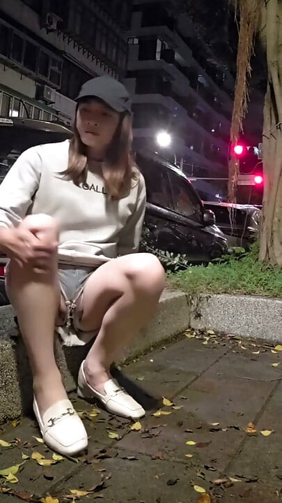 Shemale Ting Xuan Lifted up Her Short Skirt Outdoors.