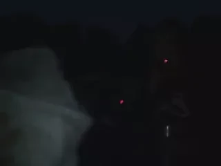 2 girls kissing in front of her friends