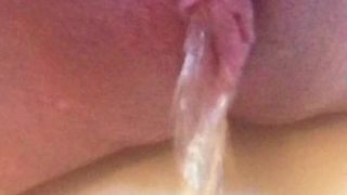 Evelle extreme close-up pissing and spreading