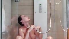 Milf having orgasms while taking a shower