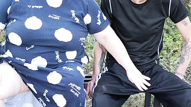mother-in-law in a public park fingering my dick on a bench