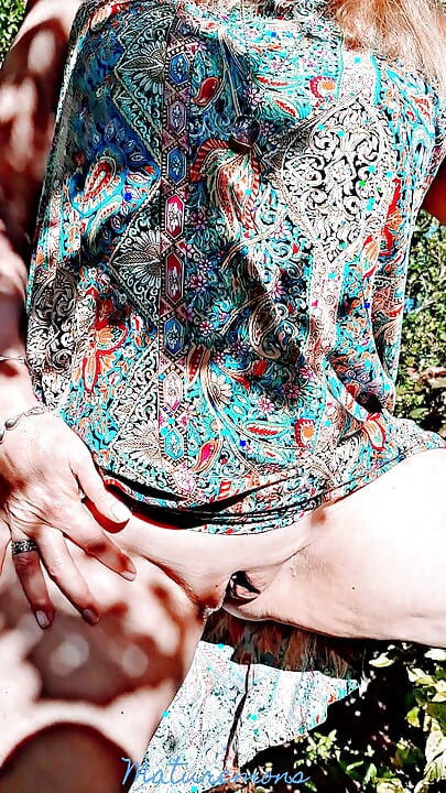 Horny mature gaping in her garden .