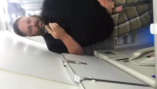 Chub stroking in an airplane bathroom
