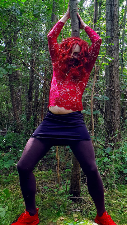 Diabolical demon bitch masturbates in public in the forest