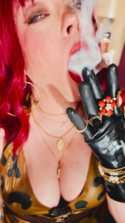 The Beautiful Rubber Beauty Tina Snua Smoking A Cigarette Using A Holder - Smoker Latex Gloves Rings Jewellery | Clip 1