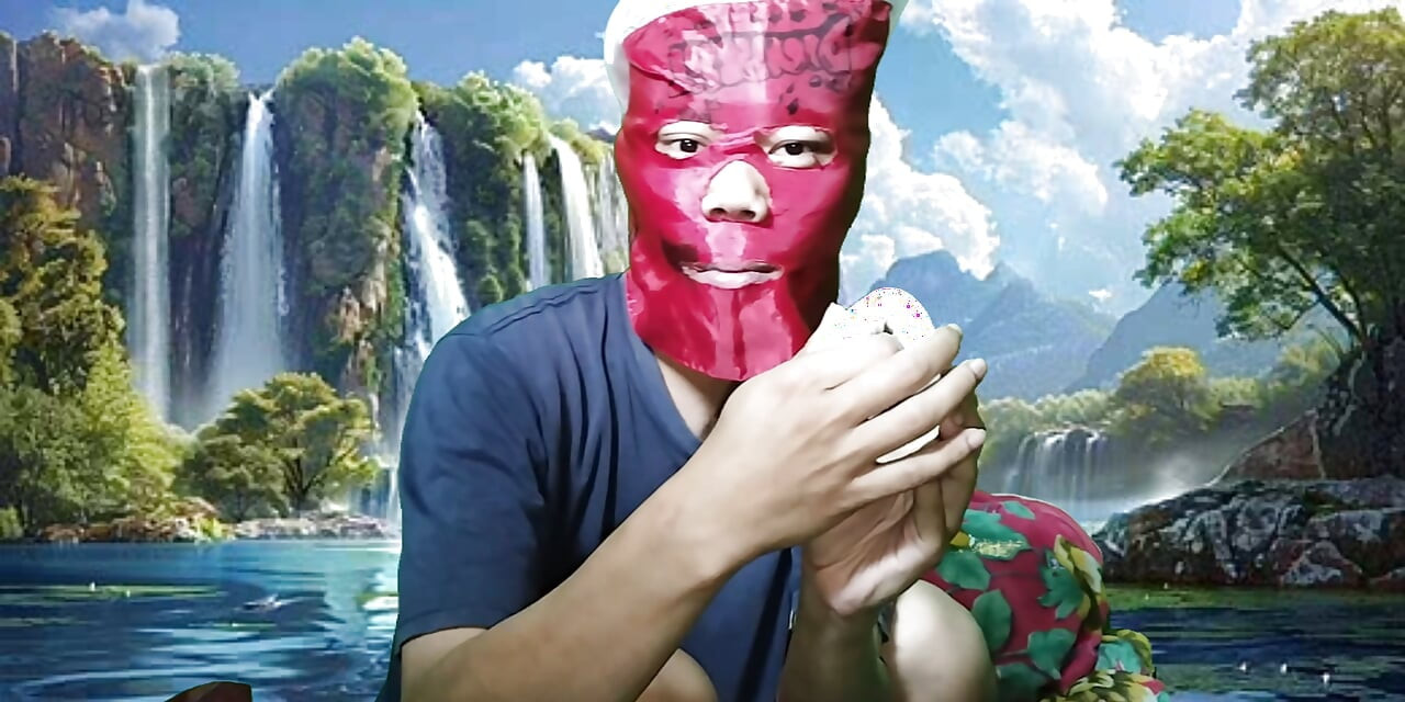 Masturbating with a dildo made from a bottle, used under a waterfall.