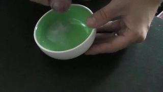 Cum in a  green bowl