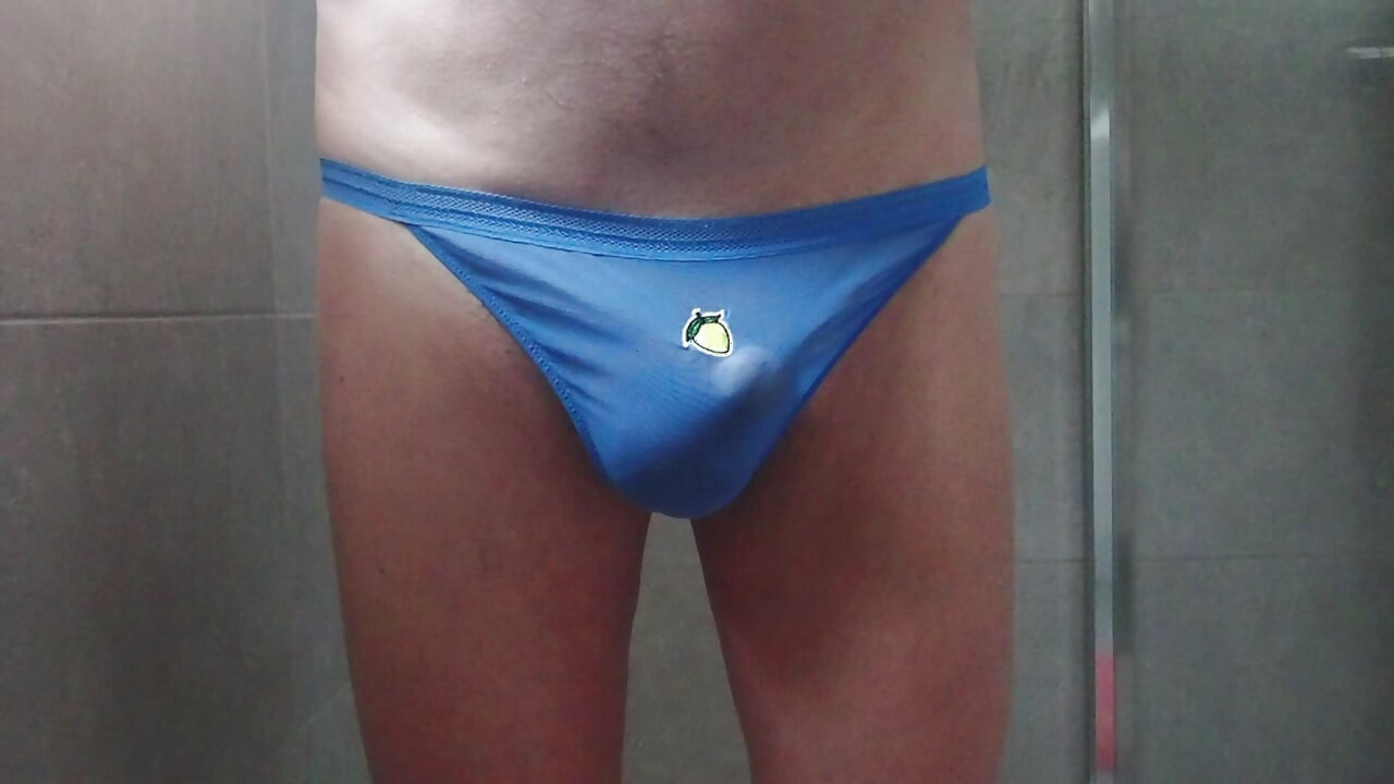 pissing in the shower in my blue thong