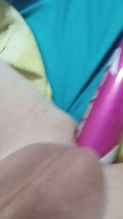 Trans girl stretches her pussy deep with a softball bat.