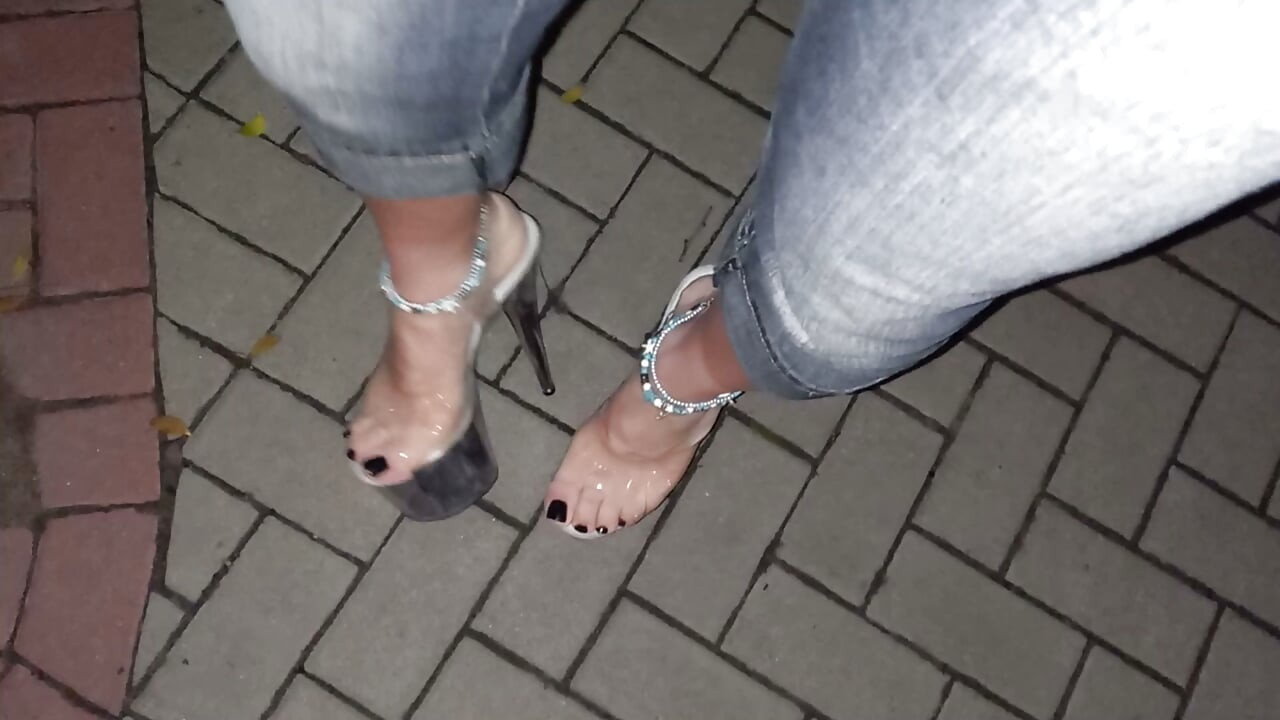 nighttime crossdressing on a public street in 20cm stripper heels, black toes, and black claws